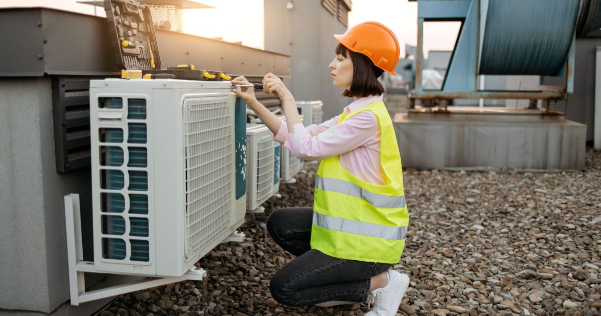 AC System Tune-Up by worker